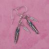 Resident Evil Claire Redfield Feather Earrings - Image 4